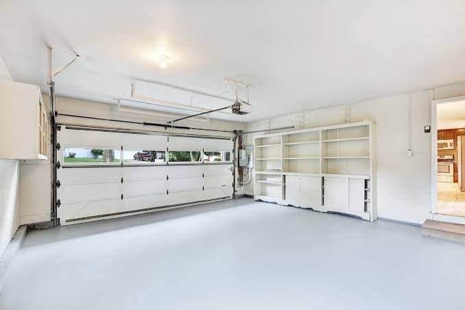 A garage door installed and closed on a home