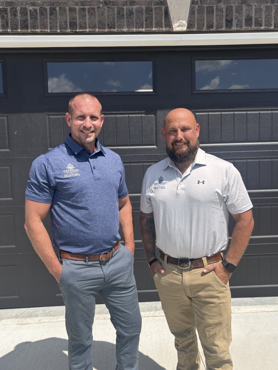 Tyler White and Jacob Schneider, the owners of Anchored Garage Doors.